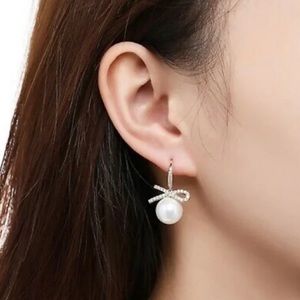 Shashi 18K Gold Plated Pearl Drop
Earrings with Pave Ribbon Bow, NWT